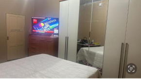 Casa confortável e bem localizada